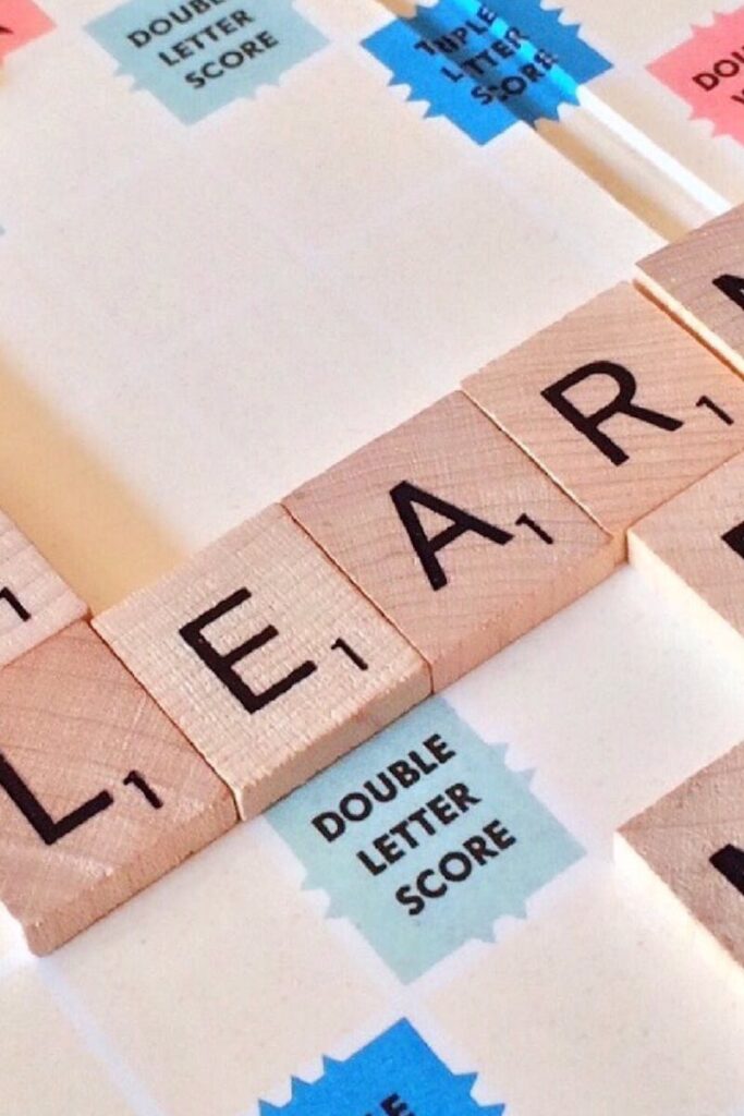 pexels-photo-256417-256417 Close-up of Scrabble tiles forming words related to education and school.
