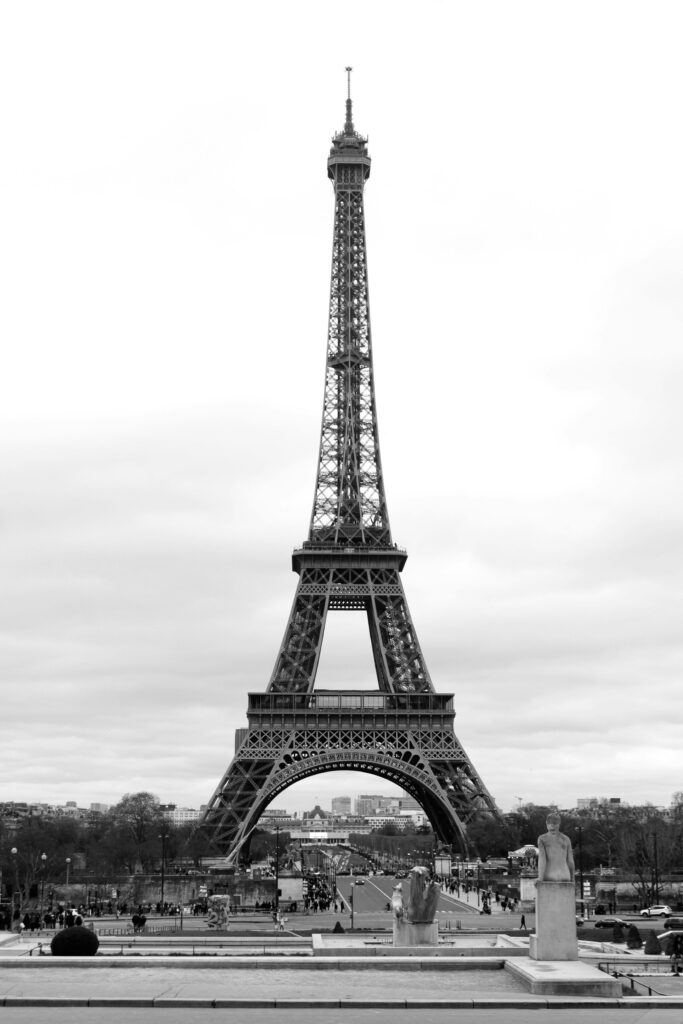 pexels-photo-3721426-3721426 Black and white majestic famous Eiffel Tower against Elysian Fields on summer day
